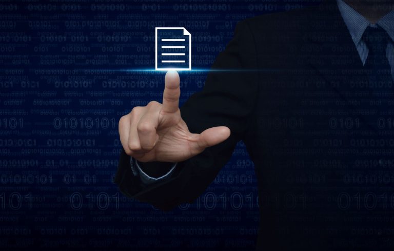 A businessman using his finger to press a floating document icon.