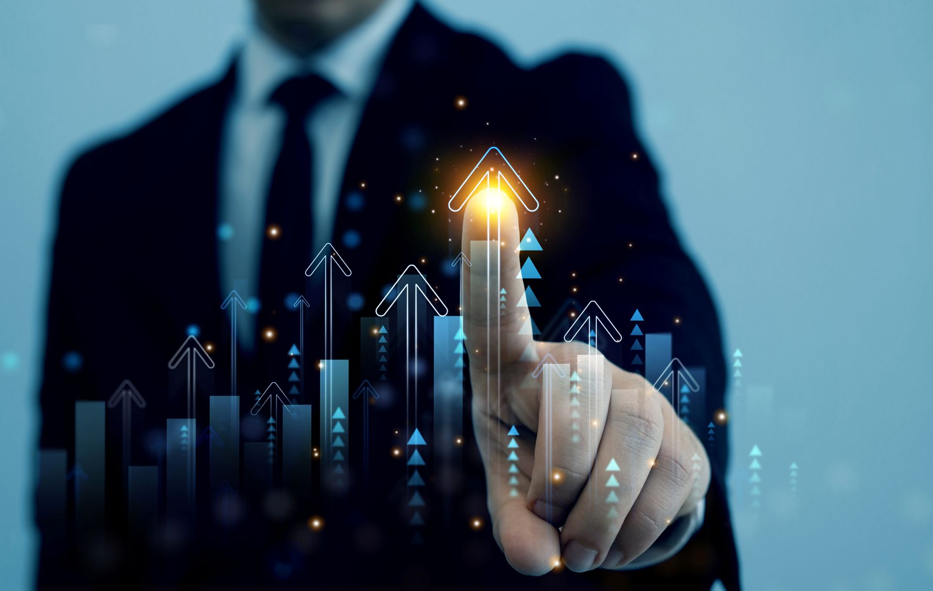 A business man pointing at a chart.